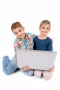 Two little kids using a laptop Royalty Free Stock Photo