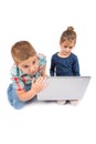 Two little kids using a laptop Royalty Free Stock Photo