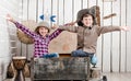 Two little laughing children with hands up Royalty Free Stock Photo