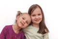 Two little sibling little girls hugging each other Royalty Free Stock Photo