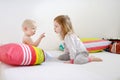 Two little sisters in bed on morning Royalty Free Stock Photo