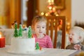 Two little sisters and a Christmas cake