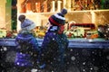 Two little toddlers, boy and girl looking on car toys in a window on Christmas time season. Fascinated children dreaming Royalty Free Stock Photo