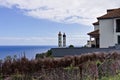 Two little towers in a panoramic garden of a House in Madeira above the Atlantic Ocean Portugal