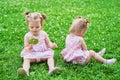 Two little twin girls did not share the candy Royalty Free Stock Photo