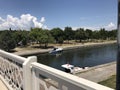 Two Little White Fishing Boats On The Still River