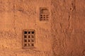 Two little windows in a typical berber house built of clay