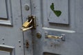 Two locks on an old wooden door, close-up. La Paz, Bolivia Royalty Free Stock Photo