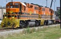 Two locomotives move freight on a small line