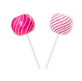 Two lollipop in form of ball with white and pink stripes