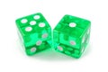 Two green dice isolated on a white background. Five and one are so close