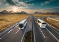 Two lone buses on highway at idyllic sunny morning Royalty Free Stock Photo