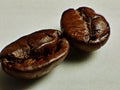 Two lonely roasted coffee beans Royalty Free Stock Photo