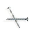 Two long self tapping iron screws, High resolution macro close up isolated on white background. Royalty Free Stock Photo