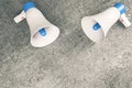 Two loud speakers on concrete background Royalty Free Stock Photo