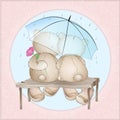 Two lovers bears sitting on a bench under an umbrella
