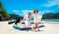 Two lovers and a boat on the paradise Seychelles