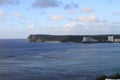 Two lovers point from Tumon beach in Guam Royalty Free Stock Photo