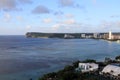 Two lovers point from Tumon beach in Guam Royalty Free Stock Photo