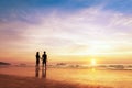 Two lovers standing together on a beach thinking about life