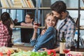 Two loving couples resting in room Royalty Free Stock Photo