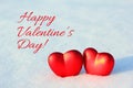 Two Hearts in the Snow with Text. Love, Valentine`s Day Royalty Free Stock Photo