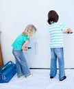 Two loving siblings decorating their house Royalty Free Stock Photo