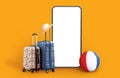 Two luggages travel bags and big smartphone, mockup Royalty Free Stock Photo