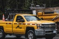 Two Mainroad North Island service vehicles on a Highway 28 near Strathcona Provincial Park Royalty Free Stock Photo