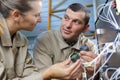 two maintenance engineers checking cables Royalty Free Stock Photo