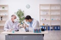 Two male chemists working at the lab during pandemic Royalty Free Stock Photo