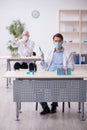 Two male chemists working at the lab during pandemic Royalty Free Stock Photo