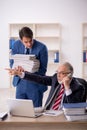 Two male colleagues working in the office Royalty Free Stock Photo