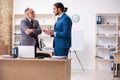 Two male colleagues working in the office Royalty Free Stock Photo