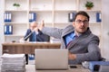 Two male colleagues working in the office Royalty Free Stock Photo