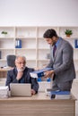 Two male colleagues working in the office Royalty Free Stock Photo