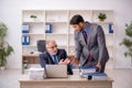 Two male colleagues working in the office Royalty Free Stock Photo