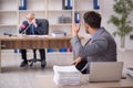 Two male colleagues working in the office Royalty Free Stock Photo