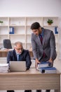 Two male colleagues working in the office Royalty Free Stock Photo