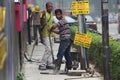 Two male construction workers at work