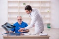 Two male doctors radiologists working in the clinic