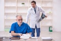 Two male doctors radiologists working in the clinic