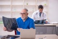 Two male doctors radiologists working in the clinic