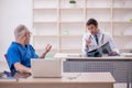 Two male doctors radiologists working in the clinic