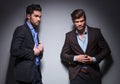 Two male fashion models posing in studio Royalty Free Stock Photo