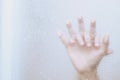 Two male and female Couple lovers holding hands having sex inside showers bathroom mirror with a steamy window. soft focus. Leave Royalty Free Stock Photo