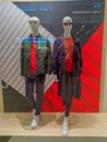 Two male and female mannequins are displayed as fashion model in the store