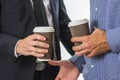 Two male friends are meeting to drink coffee together. Business coffee meeting. Coffee break Royalty Free Stock Photo