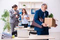 Two male and one female employees working in the office Royalty Free Stock Photo