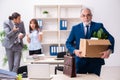 Two male and one female employees working in the office Royalty Free Stock Photo